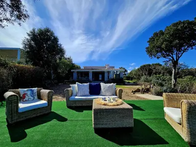 Area soggiorno di Splendida Villa Vista Mare Spiaggia privata