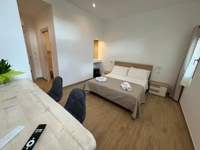 Letto o letti in una camera di MaJaMy house