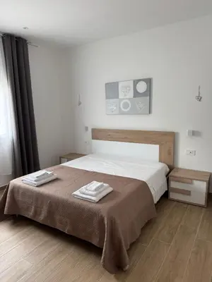 Letto o letti in una camera di MaJaMy house