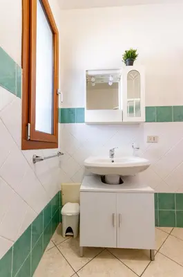 Bagno di Appartamento Pina Caletta sul mare