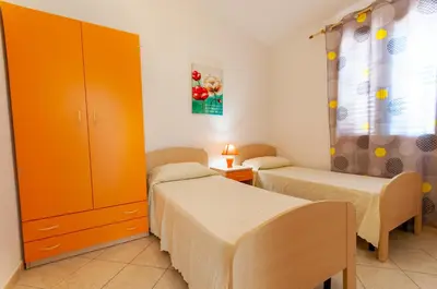 Letto o letti in una camera di Appartamento Valentina Caletta sul mare