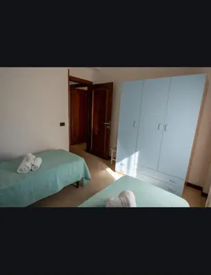 Letto o letti in una camera di Appartamento Maria Giovanna Caletta sul mare