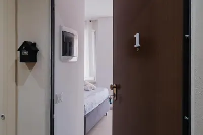 Letto o letti in una camera di BED INN - Palazzo Urbe