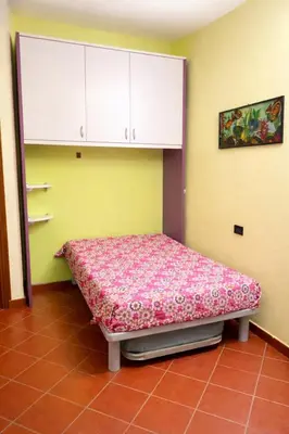 Letto o letti in una camera di Casa Mia