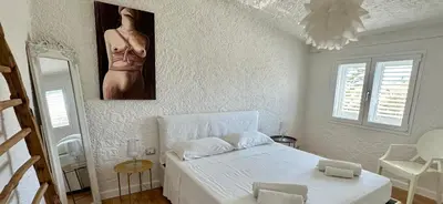 Letto o letti in una camera di Boutique Art W9