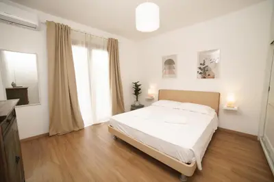 Letto o letti in una camera di Casa Rosy