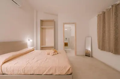 Letto o letti in una camera di Affittacamere Avedí