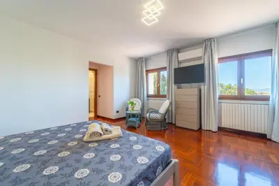 Letto o letti in una camera di Garden Park Affittacamere