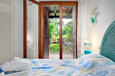 Letto o letti in una camera di Villa Silnis -Puntaldia