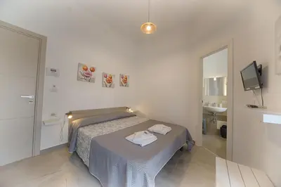 Letto o letti in una camera di Casa Lucia