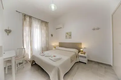 Letto o letti in una camera di Casa Lucia