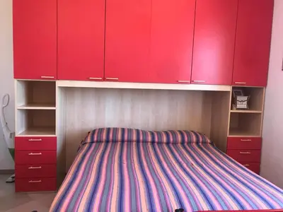 Letto o letti in una camera di Il mirto in fiore