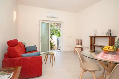Area soggiorno di Angela house