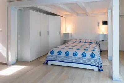 Letto o letti in una camera di In Centro Da Rox e Manu LT - PMS CaseVacanze