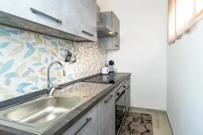 Cucina o angolo cottura di In Centro Da Rox e Manu LT - PMS CaseVacanze