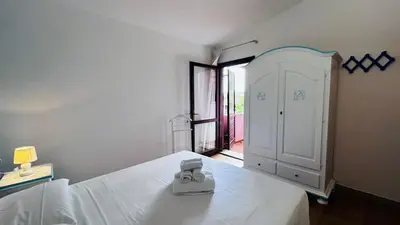 Letto o letti in una camera di Casa MARCO Villaggio Le mandorle