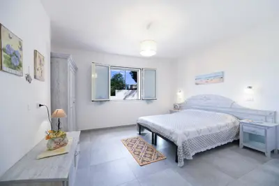 Letto o letti in una camera di Orosei Mare