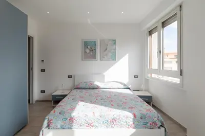 Letto o letti in una camera di Casa Brezza Marina by Wonderful Italy