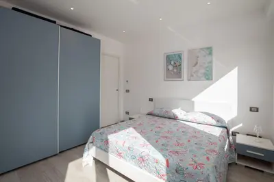 Letto o letti in una camera di Casa Brezza Marina by Wonderful Italy