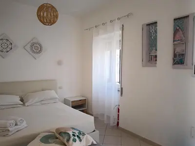 Letto o letti in una camera di Olbia City House