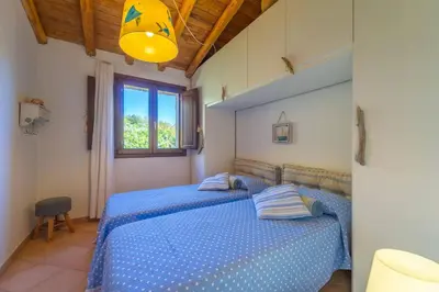 Letto o letti in una camera di Villa Molara Home - By Searly