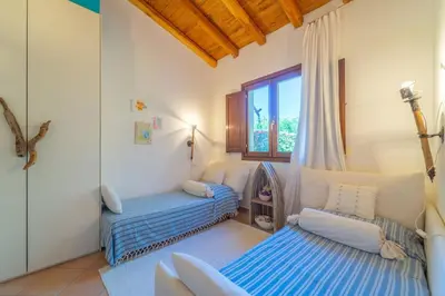 Letto o letti in una camera di Villa Molara Home - By Searly