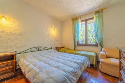Letto o letti in una camera di Villetta Dante - By Searly