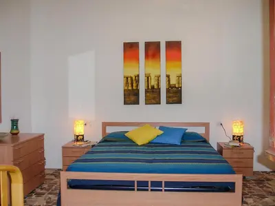 Letto o letti in una camera di Casa Vacanze da Anna e Turi
