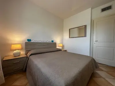 Letto o letti in una camera di Casa Dolce Casa - con piscina a un passo dal mare