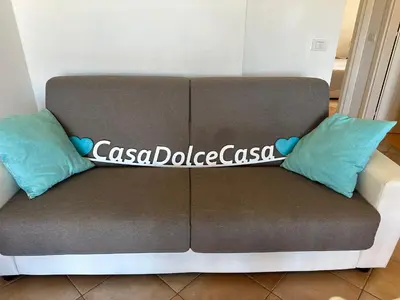 Area soggiorno di Casa Dolce Casa - con piscina a un passo dal mare