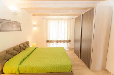 Letto o letti in una camera di Villa Sant'anna