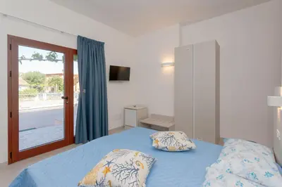 Letto o letti in una camera di Domo Davide
