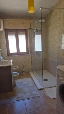 Bagno di Autentica vita dell'isola-CasaMà tra mari e monti