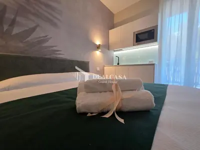 Letto o letti in una camera di DEALCASA Guest House