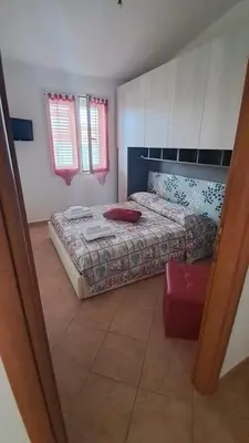 Letto o letti in una camera di Domo Susy