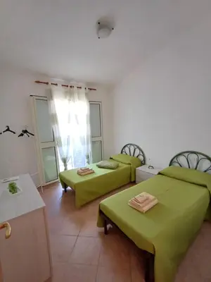 Letto o letti in una camera di Domo Susy