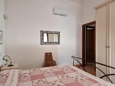 Letto o letti in una camera di Villetta Via Sardegna - Budoni Sweet Home