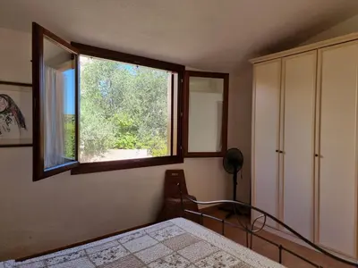 Letto o letti in una camera di Villetta Via Sardegna - Budoni Sweet Home