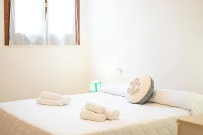 Letto o letti in una camera di Girasole