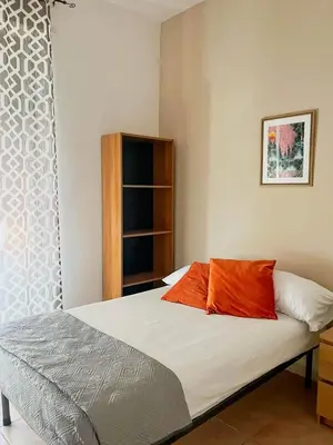 Letto o letti in una camera di Casa Isabella