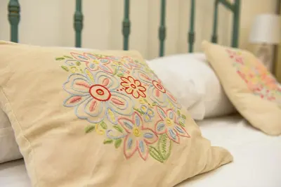 Letto o letti in una camera di Casa Isabella