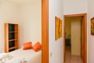 Letto o letti in una camera di Casa Isabella