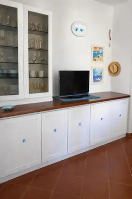 TV o dispositivi per l'intrattenimento presso Residenze Piras - Budoni Sweet Home