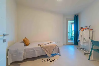 Letto o letti in una camera di Olbia Marina Stay - Vicino mare & APT, A/C e WIFi