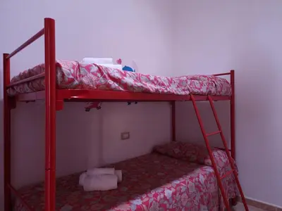 Letto o letti in una camera di Residenze Solemar