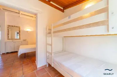 Letto o letti in una camera di Villa Fiordispina - By Searly