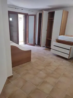 Letto o letti in una camera di Baia Caddinas, Golfo Aranci