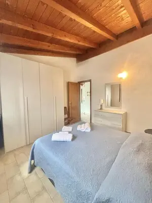 Letto o letti in una camera di Villetta Rinaggiu