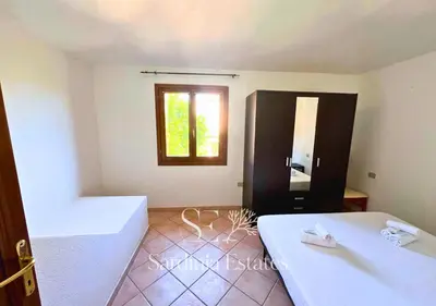 Letto o letti in una camera di Villetta Ponza - Relax e Comfort a San Teodoro