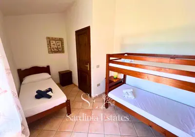 Letto o letti in una camera di Villetta Ponza - Relax e Comfort a San Teodoro